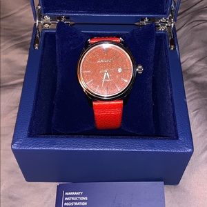 Aragon red stone dial caprice automatic watch 49mm